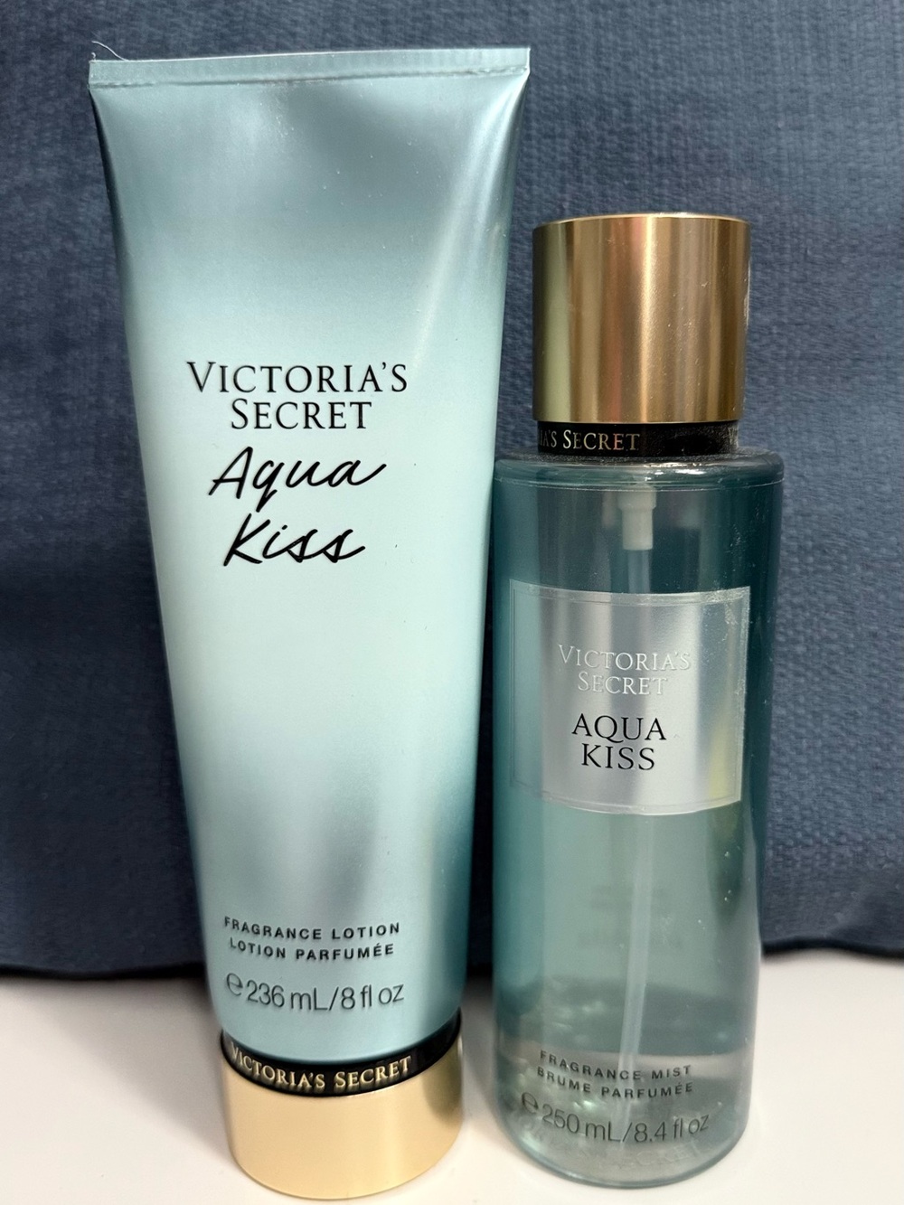 Victoria's Secret Aqua Kiss Lotion & Mist in Light Aqua with Gold Caps